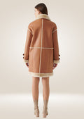 back side of Women's Long Tan Leather Shearling Coat