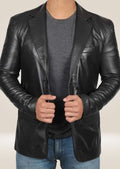 Model wearing the men's black lambskin blazer, showcasing its elegant and refined silhouette.