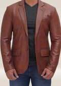 Detail of the buttons and stitching on the men's brown leather two-button blazer, emphasizing quality and classic style