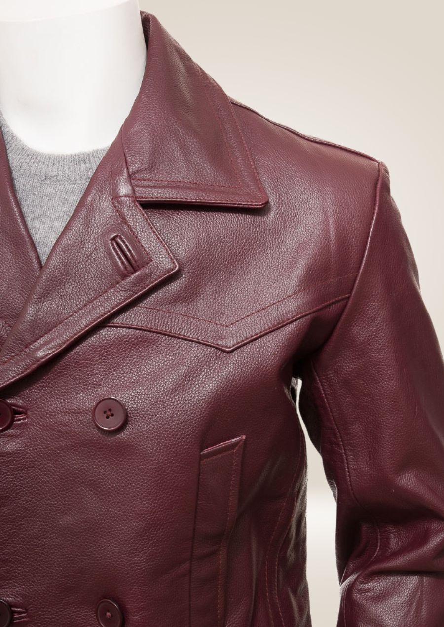 Men's burgundy pea coat with a classic double-breasted design, combining bold and timeless style.